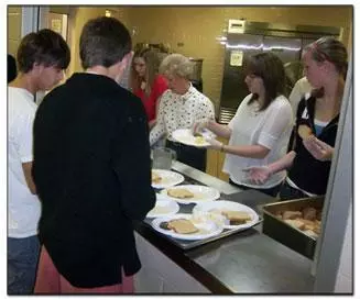 People volunteering at Greensboro Urban Ministry