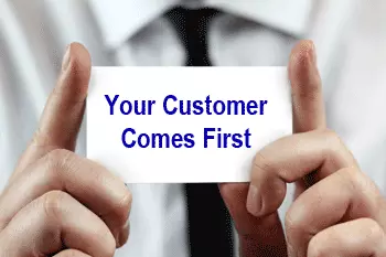 Business card says customer comes first